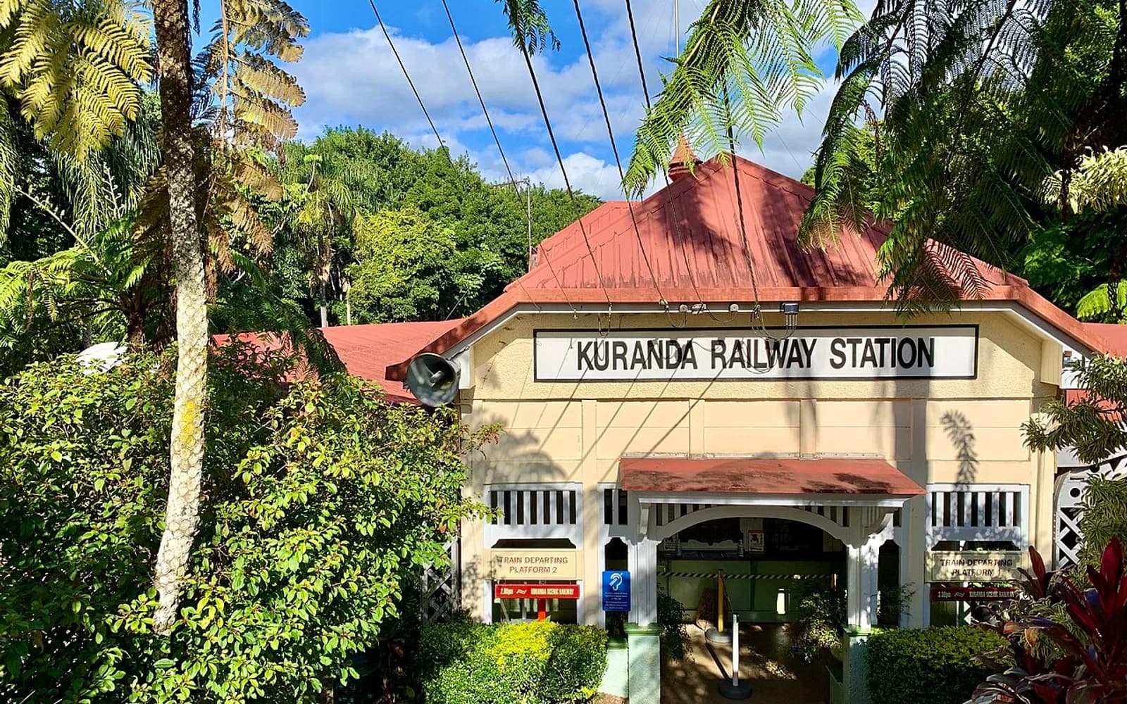 Kuranda railway station surrounded by tropical greenery